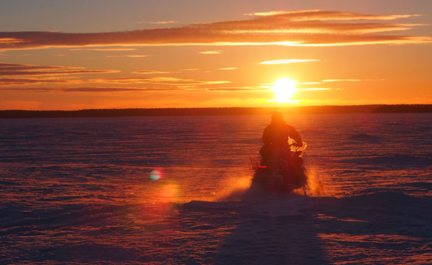 swedish lapland snowmobile tour to the lulea archipelago sunset