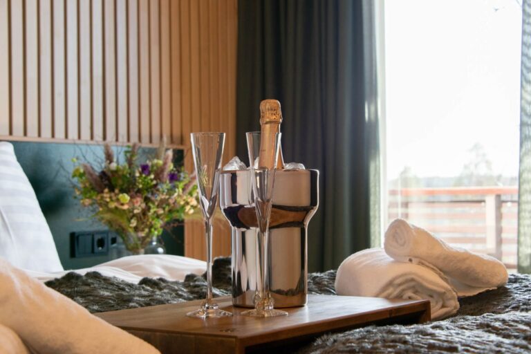 finland-haltia-lake-lodge-nuuksio-champagne-tray-on-bed