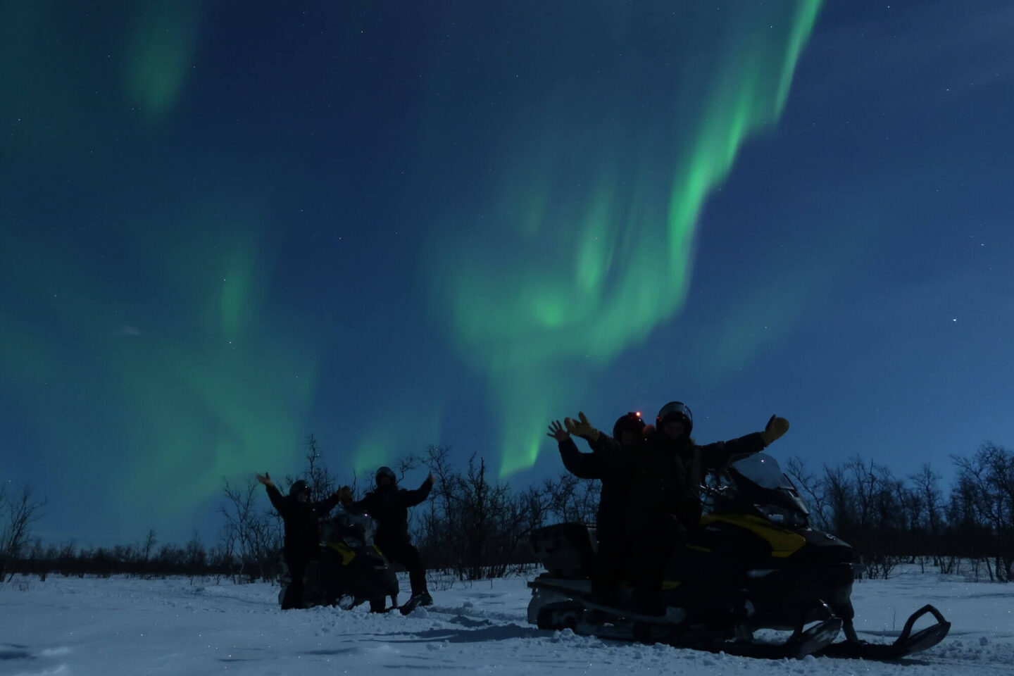 swedish-lapland-northern-lights-snowmobiling-experience-mnll