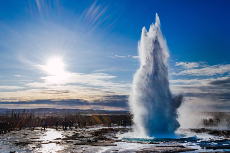 iceland strokkur geyser erupts in winter astk