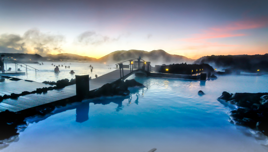 Picture of the blue lagoon in Iceland with sunset in the background