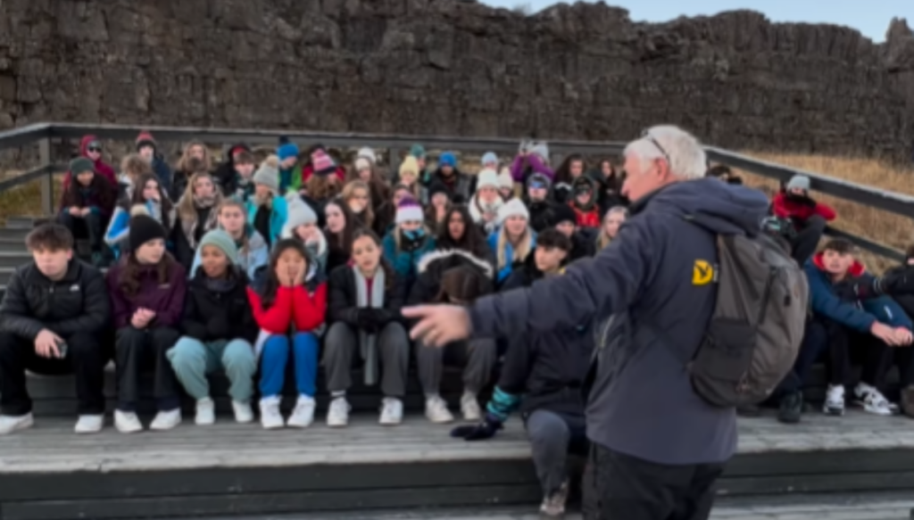 Picture of Iceland tour guide talking to a group of students at Thingvellir