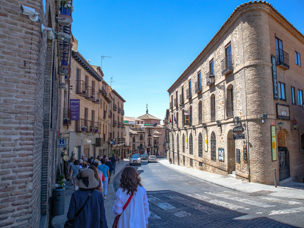 Picture of people walking through a town in Toledo