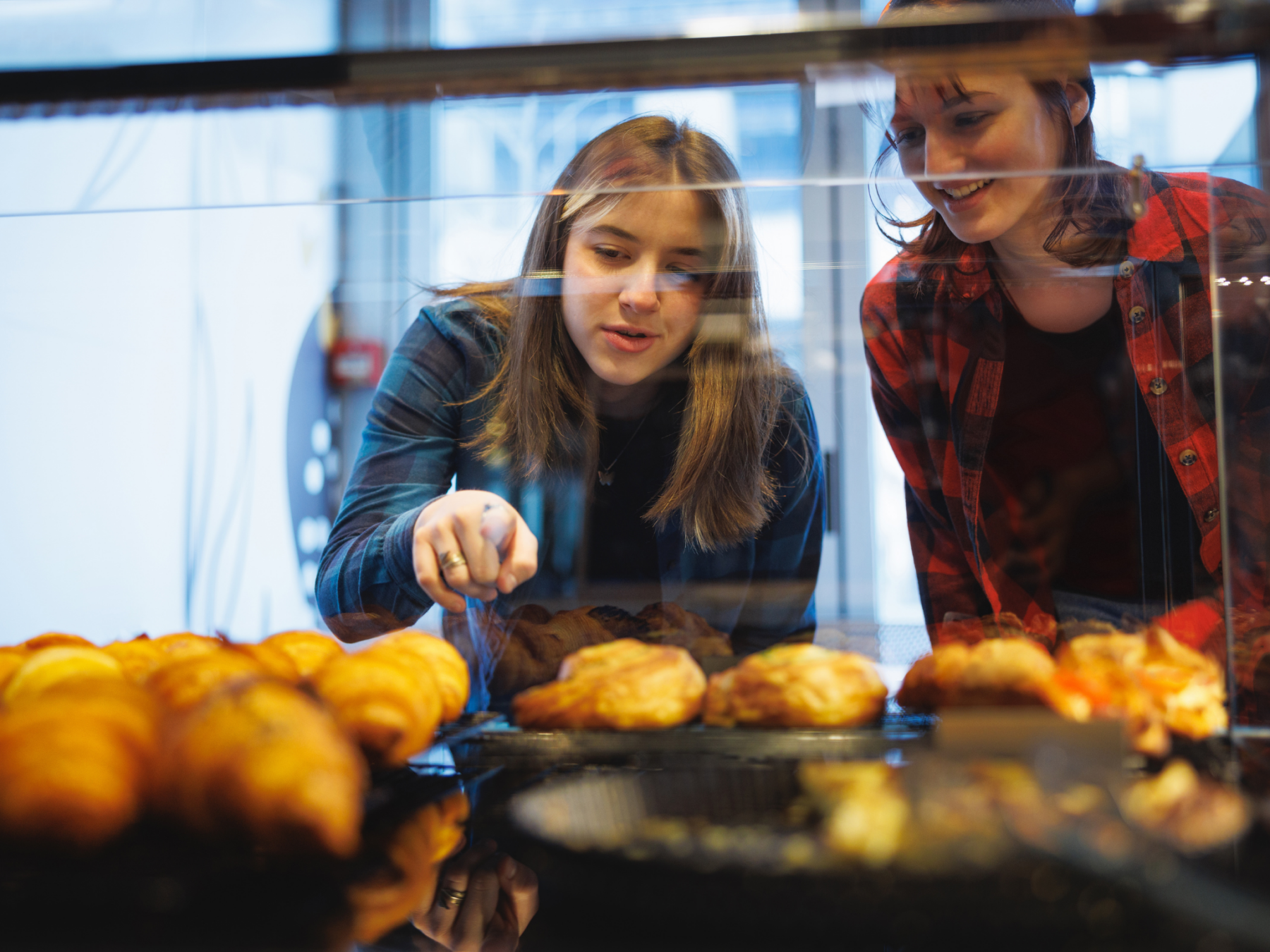 Picture of students looking at pastries in france